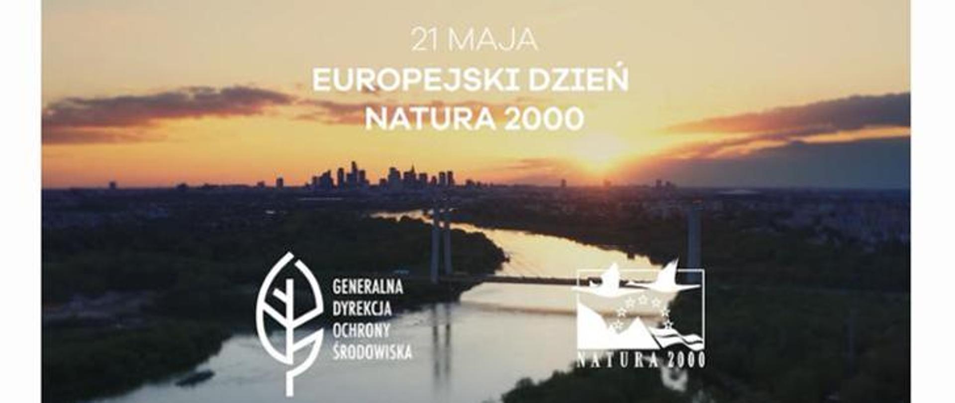 Logo GDOŚ, Natura 2000, napis 21 maja Europejski Dzień Natura 2000 w tle rzeka w oddali budynki 