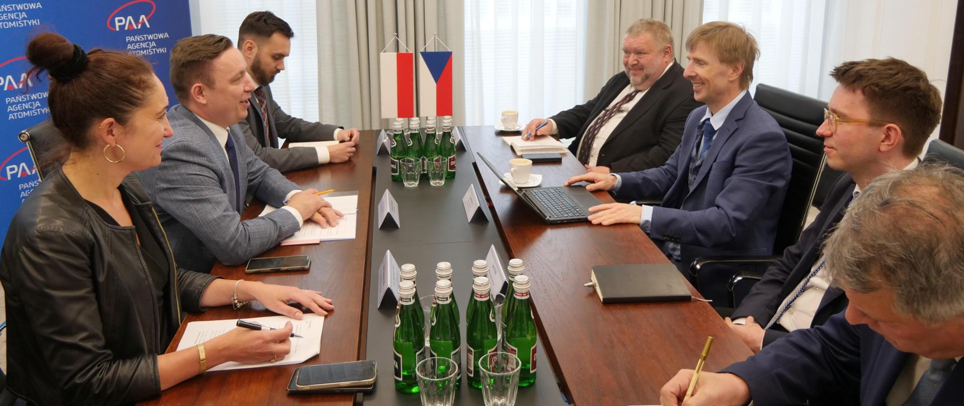 Meeting with representatives of the Czech Ministry of Industry and Trade. Meeting participants are sitting at a table.