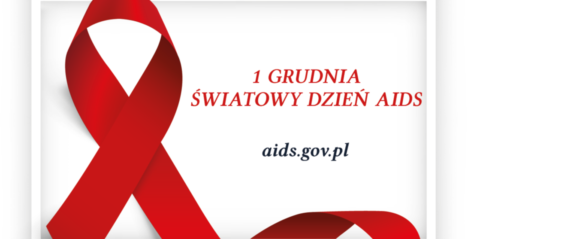 Czerwona wstążeczka symbolizująca światowy dzień AIDS, który przypada na dzień 1 grudnia wraz z adresem strony aids.gov.pl