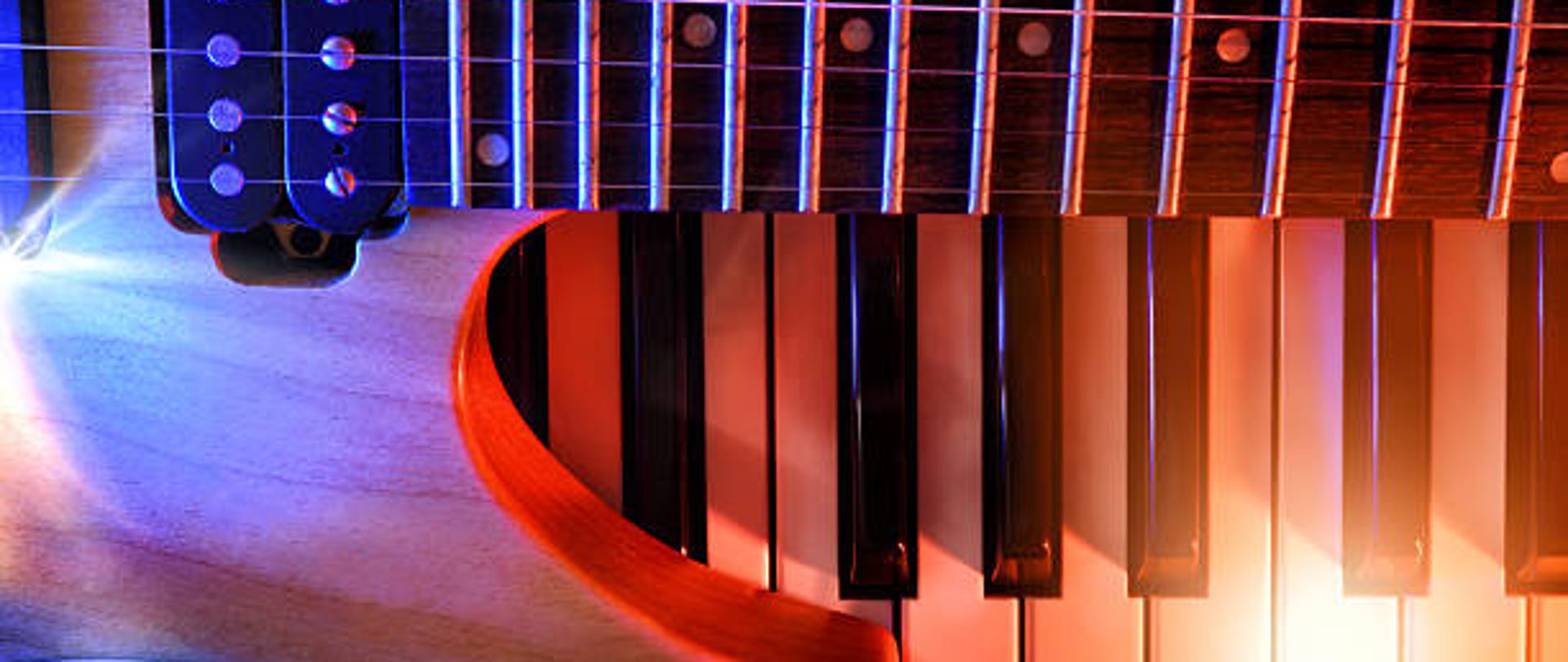 Electric guitar and synthesizer on sheet music with red and blue lights. Horizontal composition. Top view