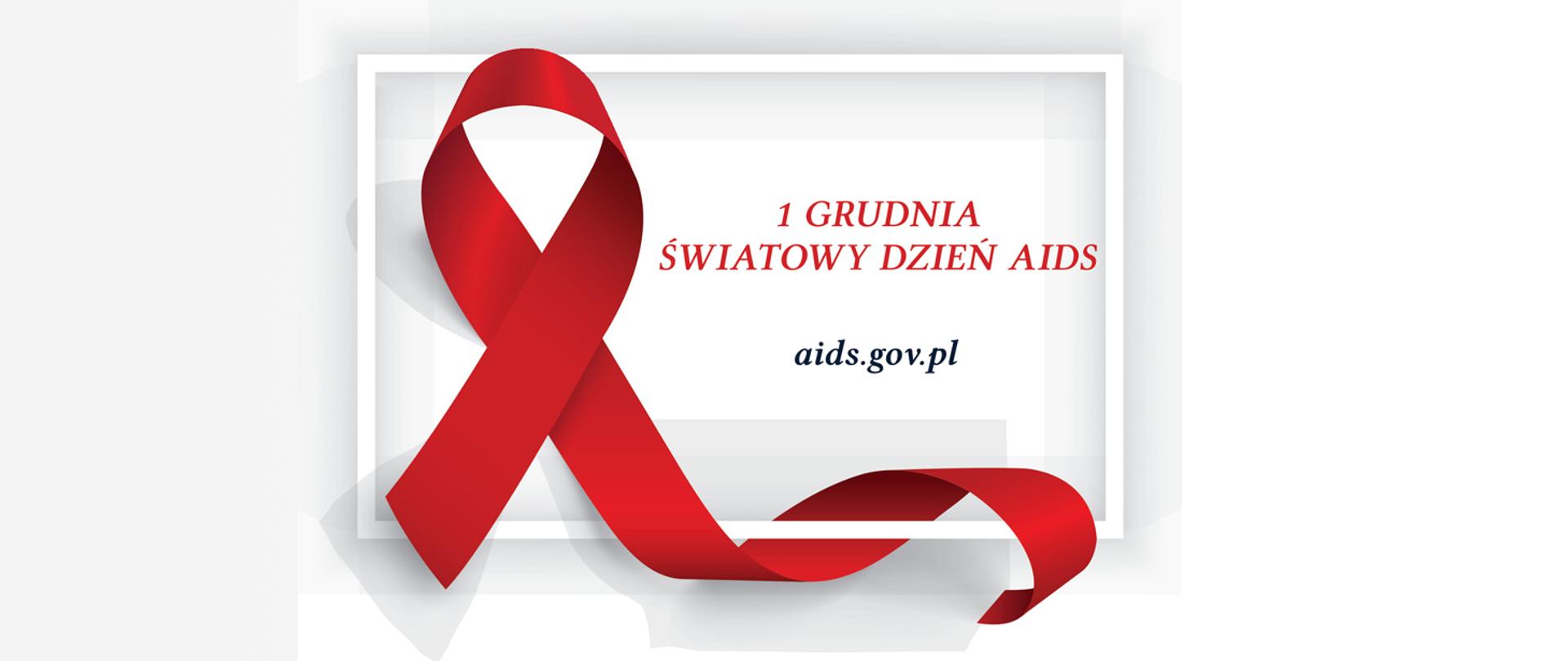 Czerwona wstążeczka - symbol Światowego Dnia AIDS obchodzonego 1 grudnia. Adres strony www: aids.gov.pl