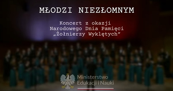 Obrazek - na lekko rozmazanym tłem przedstawiającym salę koncertową napis Młodzi niezłomnym. Koncert z okazji Narodowego Dnia Pamięci Żołnierzy Wyklętych