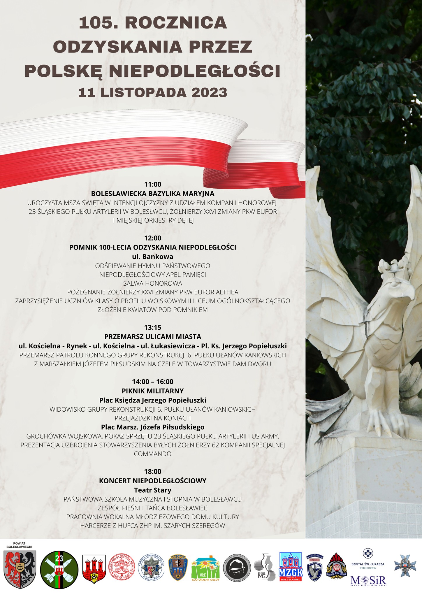 Grafika w jasnych odcieniach bieli przestawiająca po prawej stronie statuę orła i przechodzącą w górnej części wszerz Polską flagę narodową - barwy biało-czerwone. W tle znajduje się harmonogram Obchodów: "godz. 11.00 - Bolesławiecka Bazylika Maryjna - Msza Święta; godz. 12.00 - pomnik 100-lecia Odzyskania Niepodległości; godz. 13.15 - przemarsz ulicami miasta; w godz. 14.00-16.00 - piknik militarny; godz. 18.00 - koncert niepodległościowy - Teatr Stary."