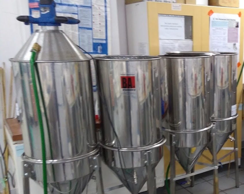 Metal installation - four silver silos in which the technological process developed in the project takes place