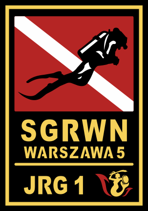 Logo w kształcie czarnej tarczy ze złotym konturem. W górnych narożnikach znajduje się flaga Polski oraz złota sylwetka Syrenki Warszawskiej. Centralną część loga tworzy czarna sylwetka nurka na tle czerwonego prostokąta z białą przekątną. Wokół jest napis Grupa Ratownictwa Wodno-Nurkowego JRG 1 Warszawa.