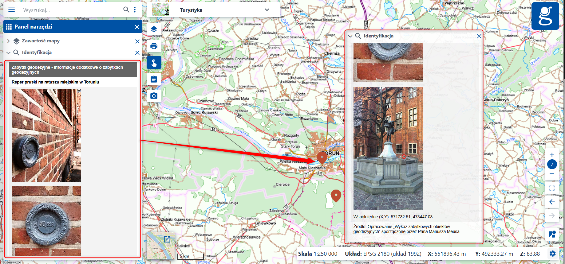 Ilustracja przedstawia opis i zdjęcie zabytku "Reper pruski na ratuszu miejskim w Toruniu"