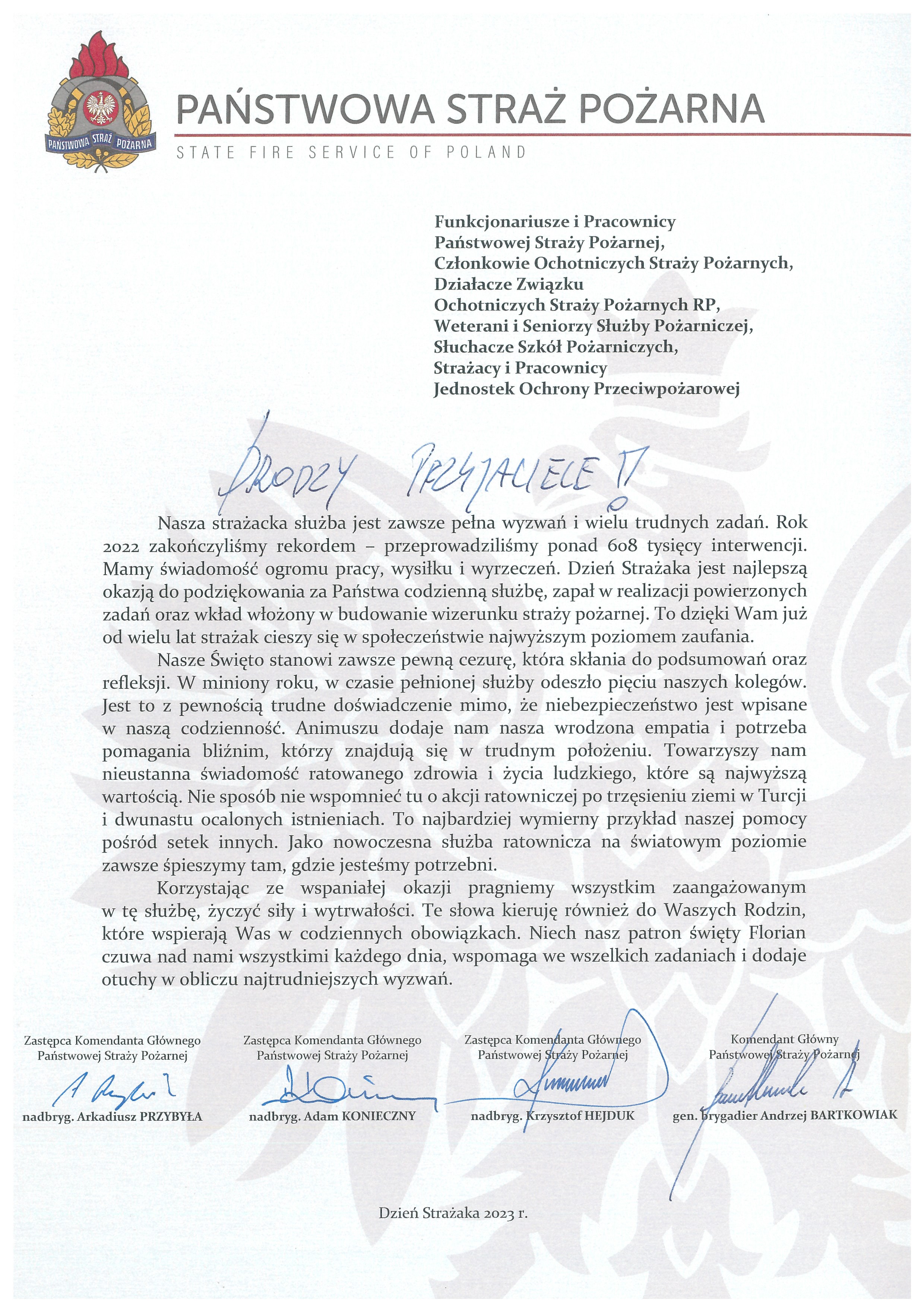 Na zdjęciu widzimy list z życzeniami od Komendanta Głównego PSP wraz z zastępcami.