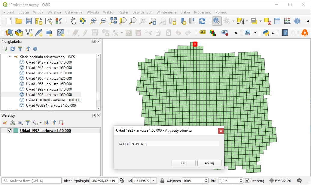 Ilustracja przedstawia zrzut ekranu z aplikacji QGIS z wczytaną siatką układu PL-1992 w skali 1:50 000.
