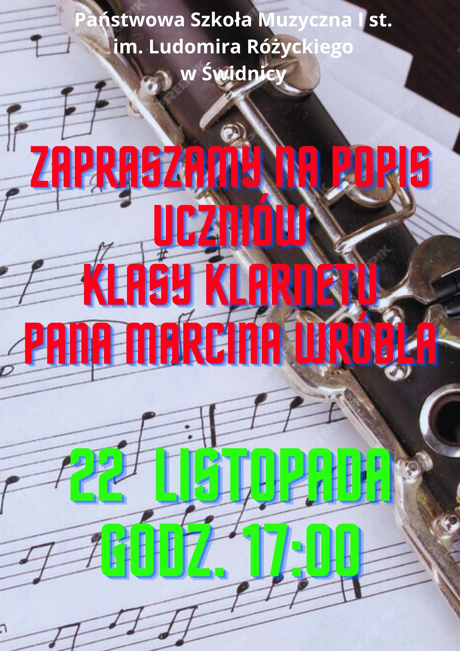 Plakat informujący o popisie tło nuty i fragment klarnetu. Kolorowe drukowane napisy czerwone i zielone.
