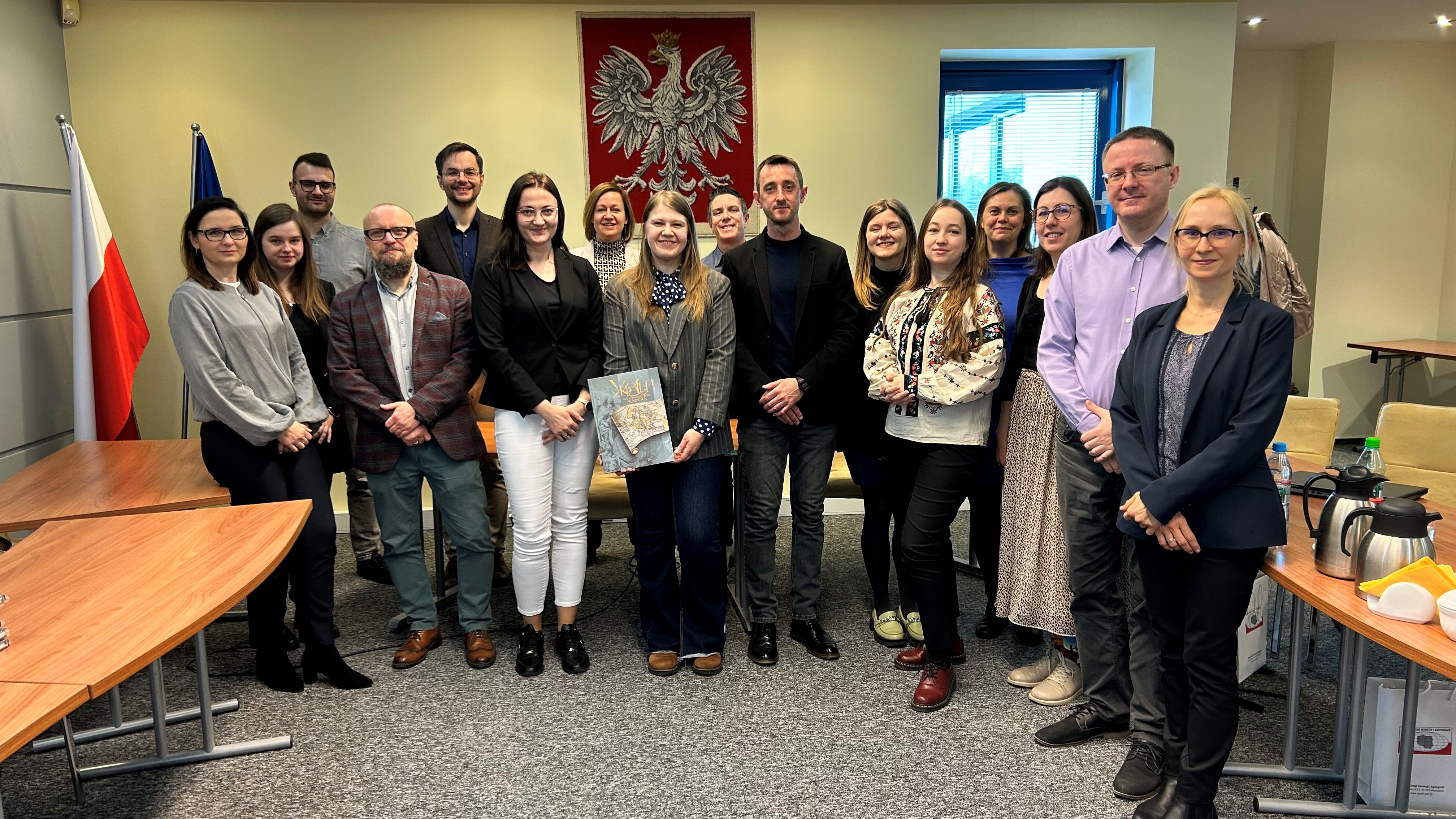 Zdjęcie przedstawia uczestników spotkania.