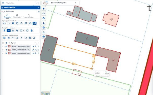 Ilustracja przedstawia widok modułu tematycznego Geodezja i Kartografia, w którym otwarty jest panel narzędzi. Widoczny jest przykład wykorzystania operacji Przyciąganie.