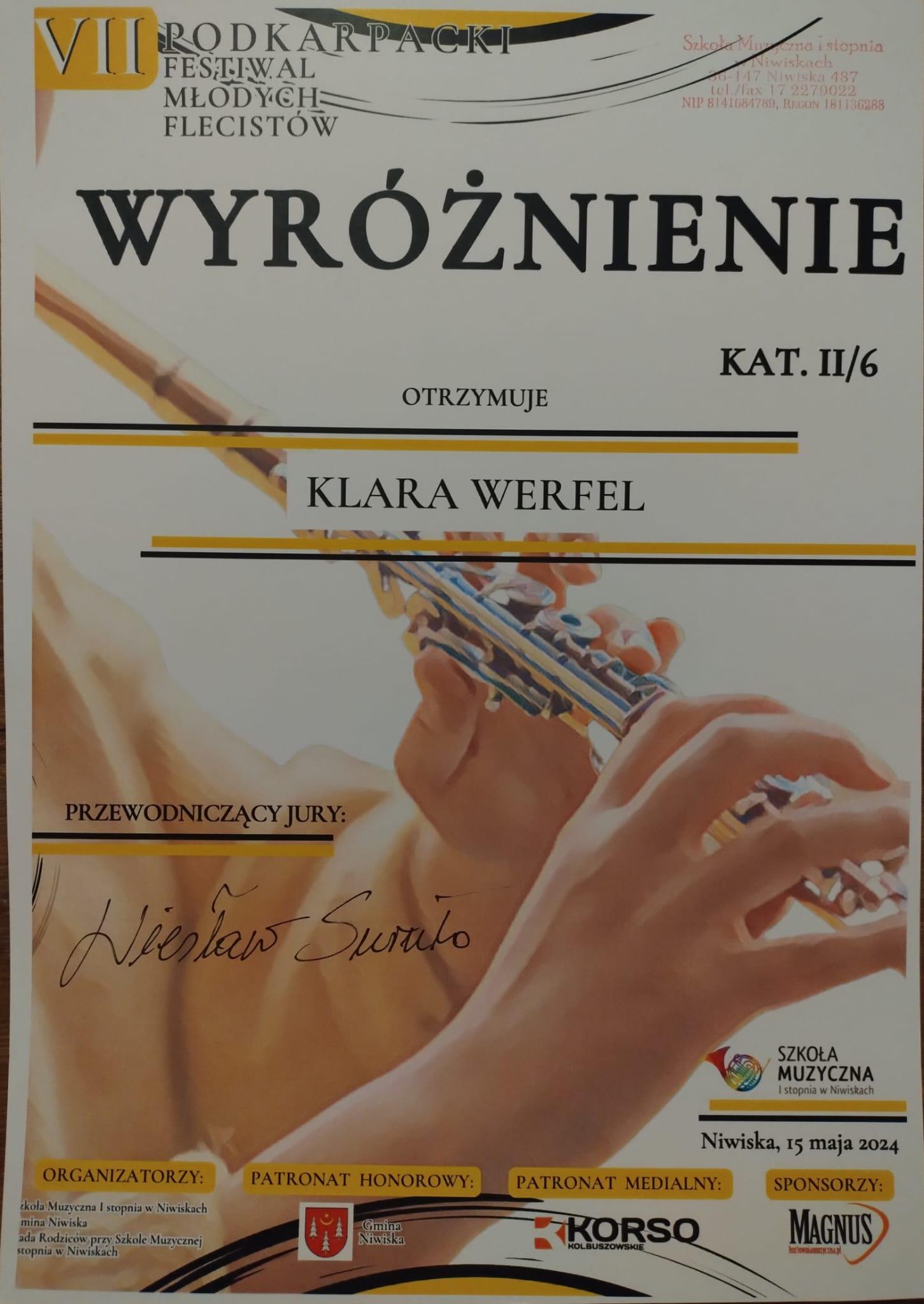 Dyplom wyróżnienia. W tle ilustracja przedstawiająca fragment osoby trzymającej w dłoniach flet. Na dole wyszczególnieni organizatorzy, patronat honorowy, patronat medialny oraz sponsorzy. Powyżej podpis przewodniczącego Jury.