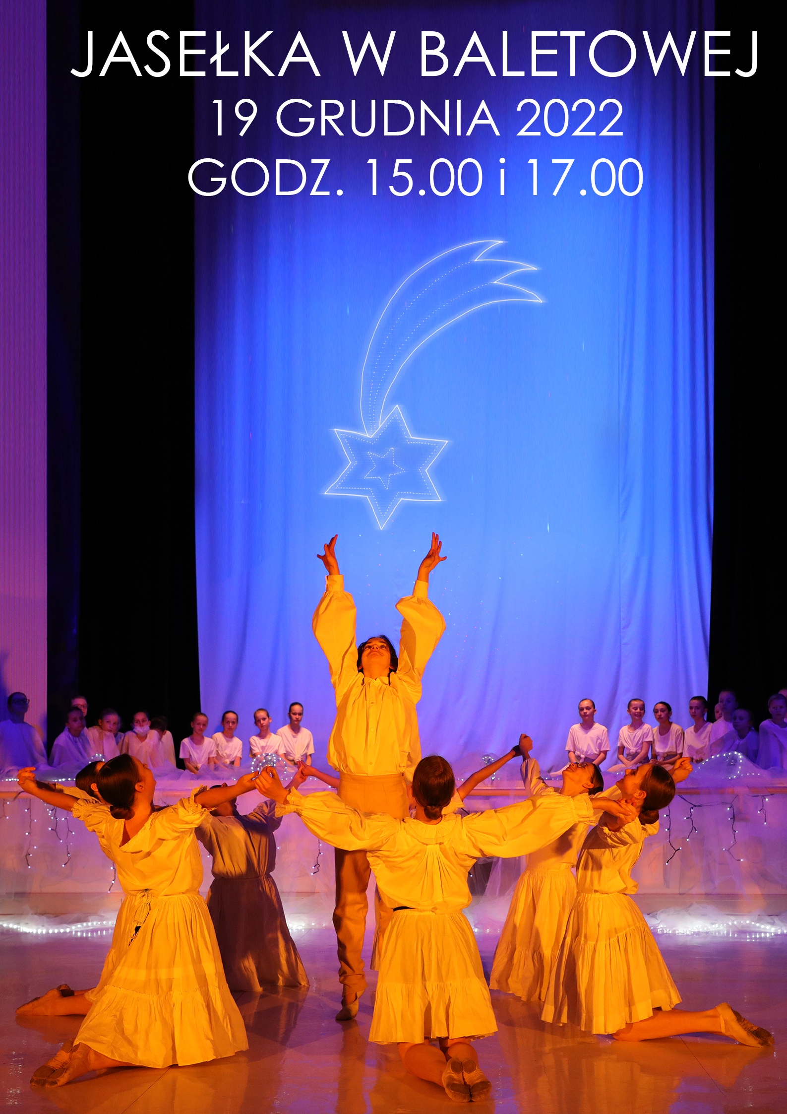 Układ taneczny, na pierwszym planie stoi tancerz z uniesionymi ku górze rękoma, wokół klęczą tancerki z rozłożonymi rękoma, w tle tancerki po prawej i lewej stronie sceny, u góry na niebieskim tle symbol Gwiazdy Betlejemskiej, nad nim napis Jasełka w baletowej 19 grudnia 2022 godz 15:00 i 17:00.