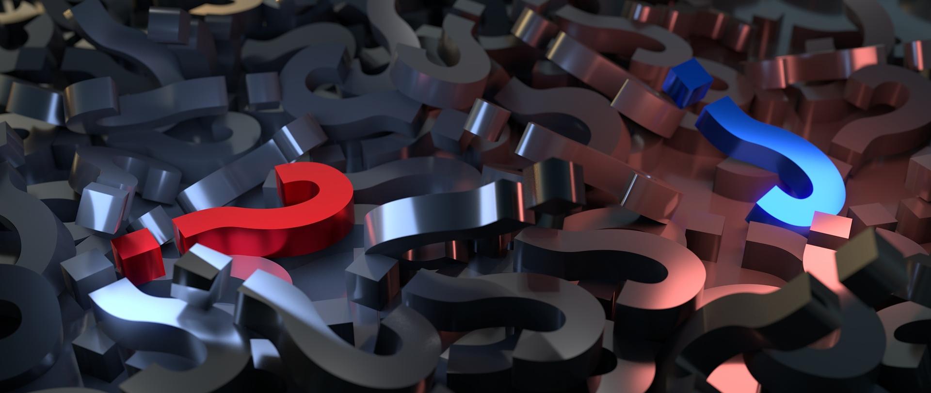 czerwony i niebieski znak zapytania.