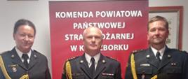 Strażacy podczas mianowania na stanowisko naczelnika wydziału. 