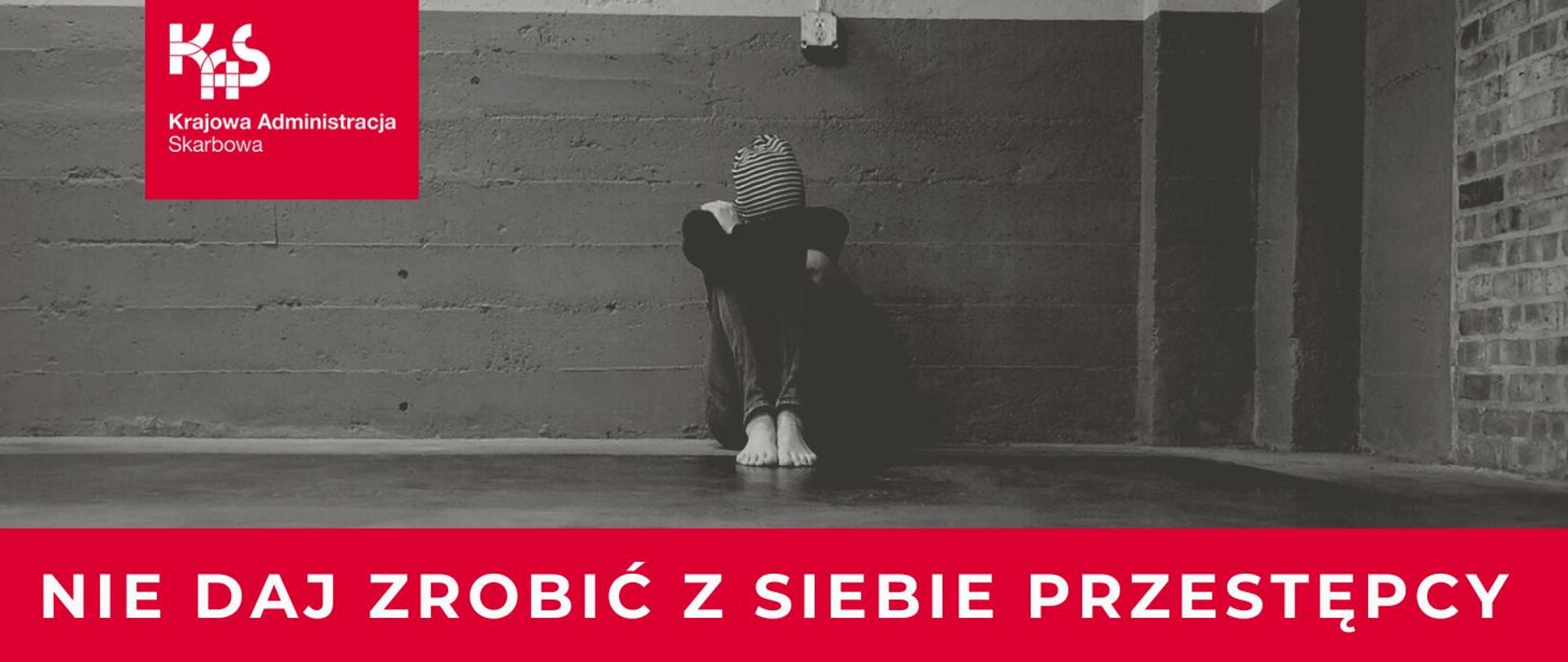 Skulona postać pod ścianą
pod spodem napis Nie daj zrobić z siebie przestępcy