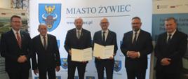 W uroczystej konferencji w dniu 15 czerwca 2026 udział wzięli (na zdjęciu od lewej): Antoni Szlagor, Burmistrz Żywca, Robert Gajda, Zastępca Prezesa Zarządu NFOŚiGW, Jakub Kliś, Prezes Zarządu MPWiK Sp. z o. o., Mirosław Suchoń, Poseł na Sejm RP.