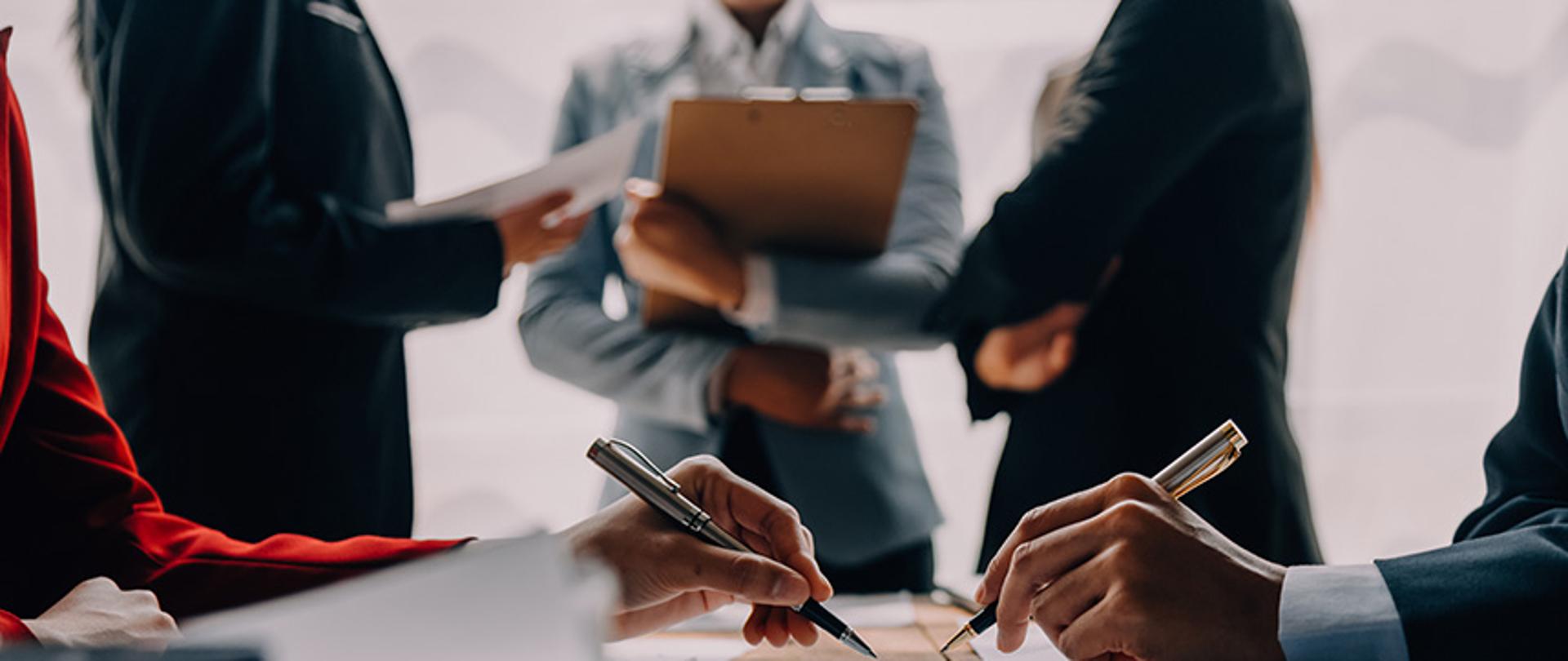 Brainstorming Collaboration and successful partnership analysis by Young business Asian people working in an office workspace