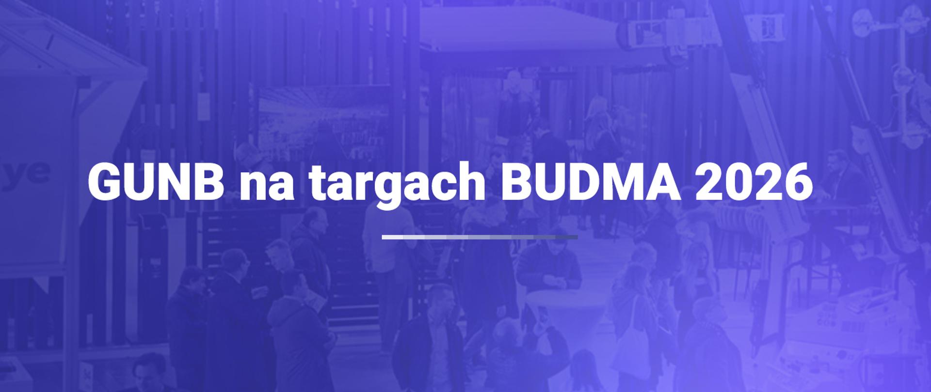 Baner informacyjny: napis „GUNB na targach BUDMA 2026” na tle hali targowej z uczestnikami i stoiskami branży budowlanej