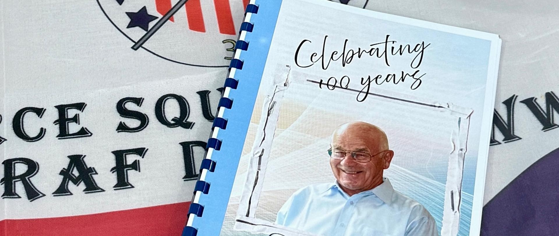 A birthday card for the 100th birthday with a photo of jubilarian.
