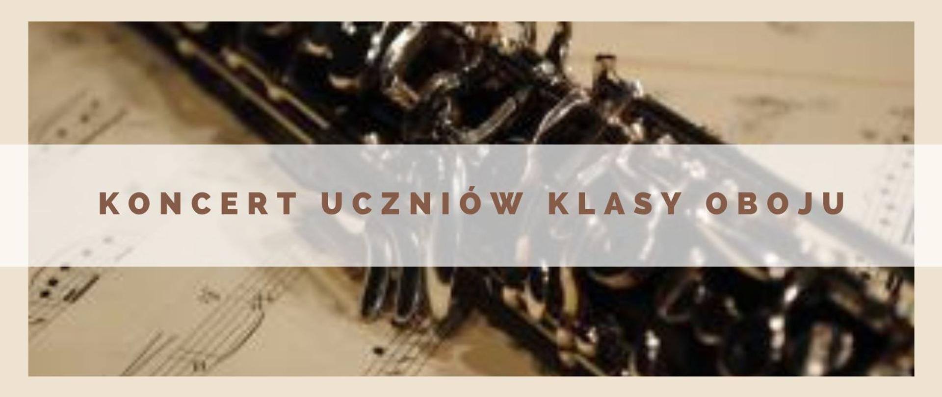 Panorama , której głównym elementem jest grafika fragmentu oboju na nutach. Na niej brązowymi literami Koncert uczniów klasy oboju.
