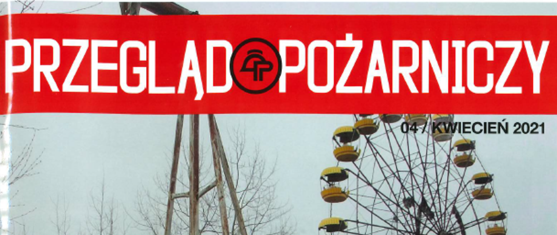 baner z napisem Przegląd pożarniczy oraz część karuzeli
