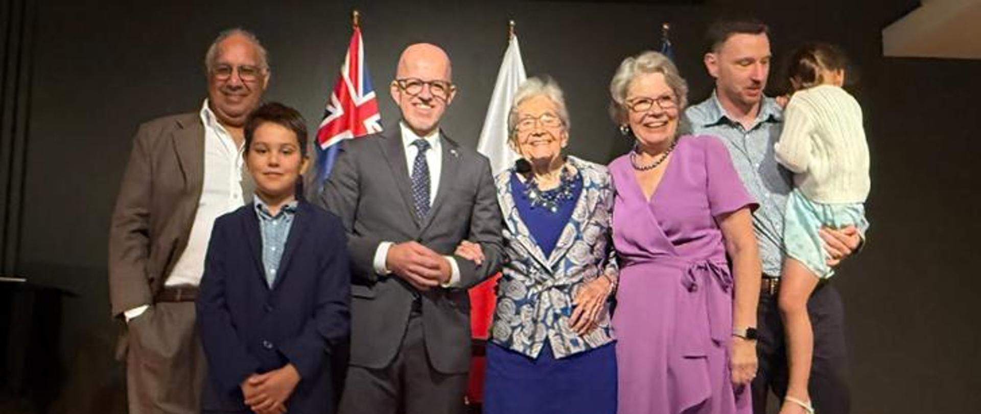 A group photo of the honoree with the Consul General and her family.