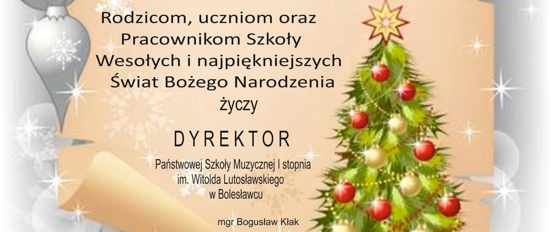 Grafika przedstawiająca na głównym planie pergamin, w prawym dolnym rogu choinkę, a po lewej stronie srebrne bombki. Całość znajduje się w otoczeniu srebrnego tła z symboliką błyszczących gwiazdek. Na pergaminie znajduje się tekst o następującej treści: "Niech te najpiękniejsze ze świąt przyniosą Wam radość, zdrowie, odpoczynek i szczęście. Niech upływają w miłej rodzinnej atmosferze. Życzę Wam Świąt pachnących choinką, skrzypiących śniegiem pod butami, a Nowy 2023 rok przyniesie tylko dobre i szczęśliwe dni. Rodzicom, uczniom oraz Pracownikom Szkoły Wesołych i najpiękniejszych Świąt Bożego Narodzenia życzy Dyrektor Państwowej Szkoły Muzycznej I stopnia im. Witolda Lutosławskiego w Bolesławcu - Bogusław Kłak. Bolesławiec, Boże Narodzenie 2022 rok".