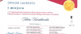 Kolorowe napisy na białym tle: DYPLOM LAUREATA I miejsca Klara Kiatkowska