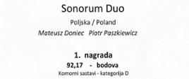Zdjęcie przedstawia dyplom na 48 Międzynarodowym Konkursie Akordeonowym w Puli dla nauczyciela PSM I stopnia w Jarocinie. Na zdjęciu podpisy jurorów, imię i nazwisko nauczyciela oraz logotypy sponsorów.