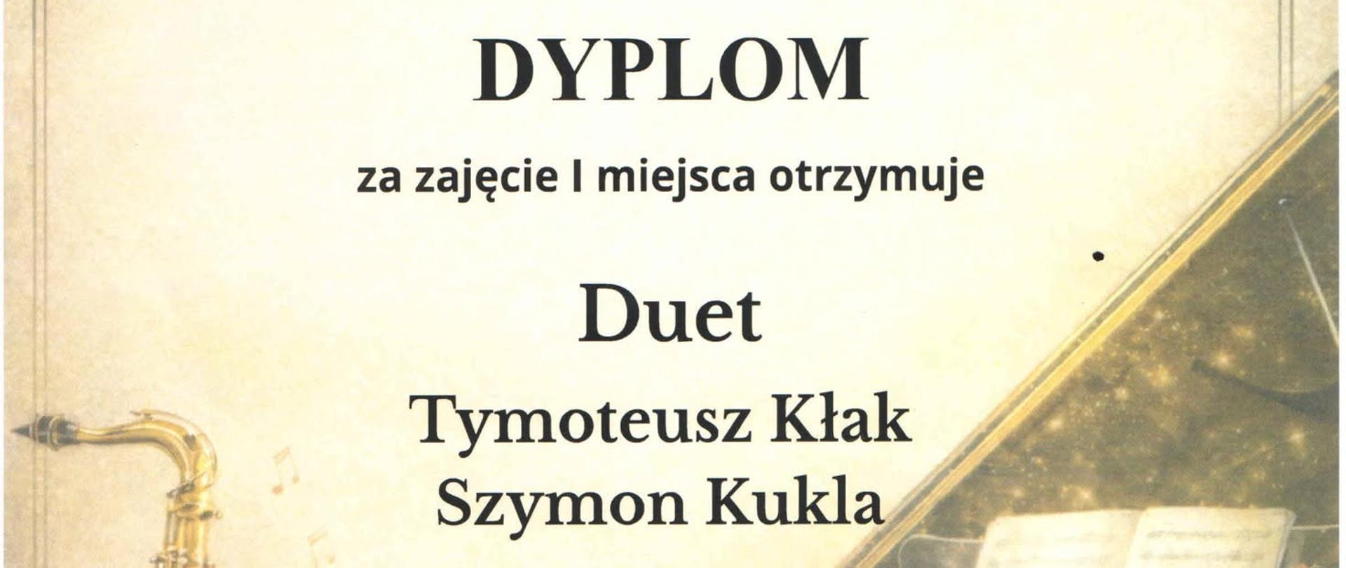 Dyplom dla Duetu Tymoteusz Kłak i Szymon Kukla za zajęcie I miejsca w II Ogólnopolskim Konkursie Muzyki Kameralnej „Młodzi Kameraliści”. Uczniowie zostali przygotowani przez P. Nowaka z ZPSM im. F. Chopina w Jarosławiu. Dyplom ma tło z grafiką saksofonu, skrzypiec i fortepianu. Pruszków, 27-28 kwietnia 2026 r.