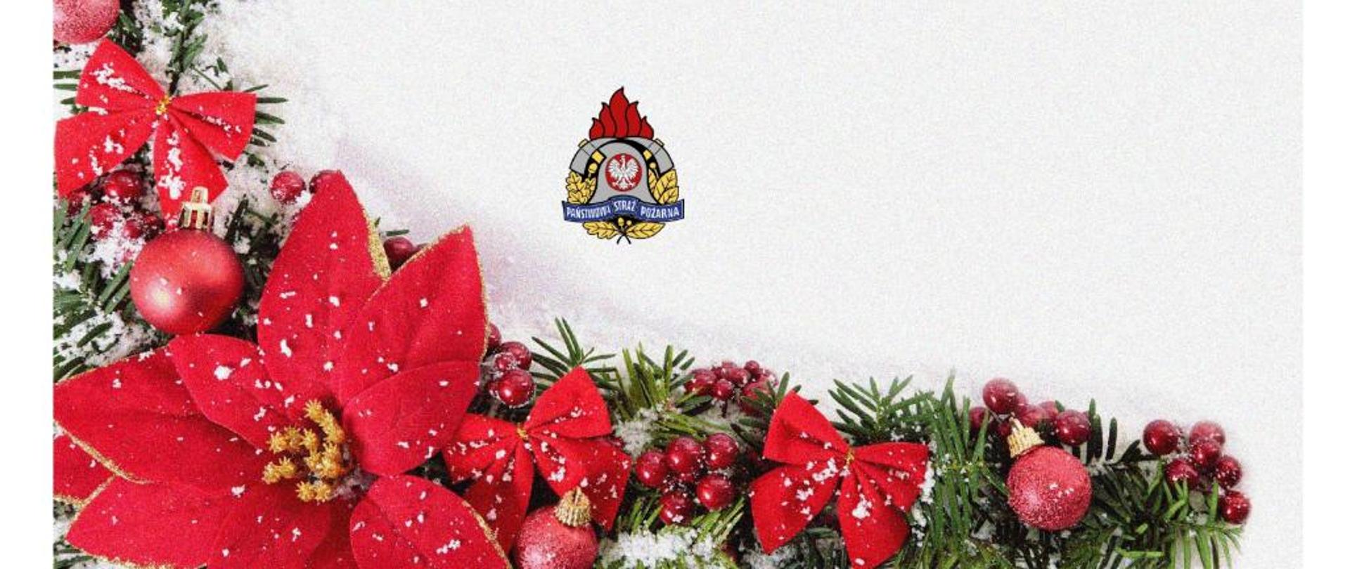 Kartka bożonarodzeniowa, stroik świąteczny i logo państwowej straży pożarnej.
