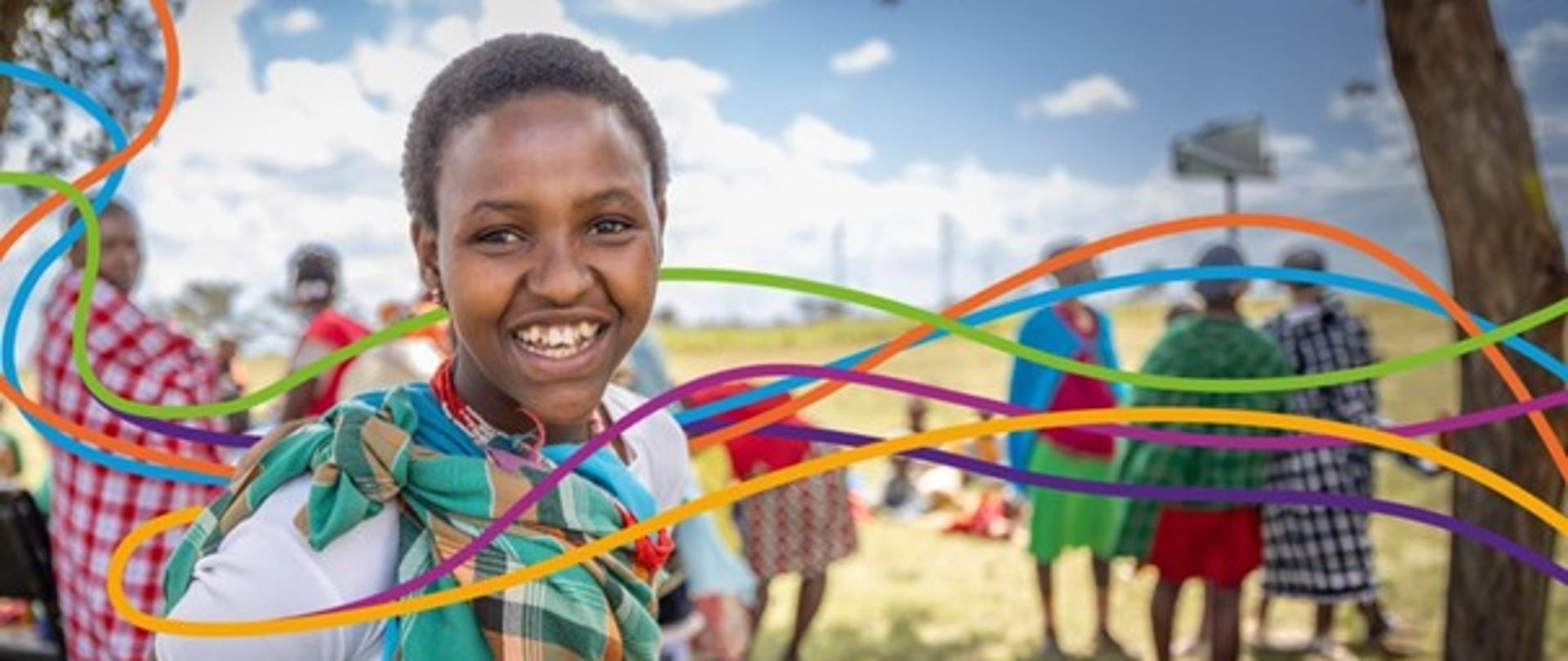 poglądowe zdjęcie czarnoskórego dziecka z kolorowymi falami