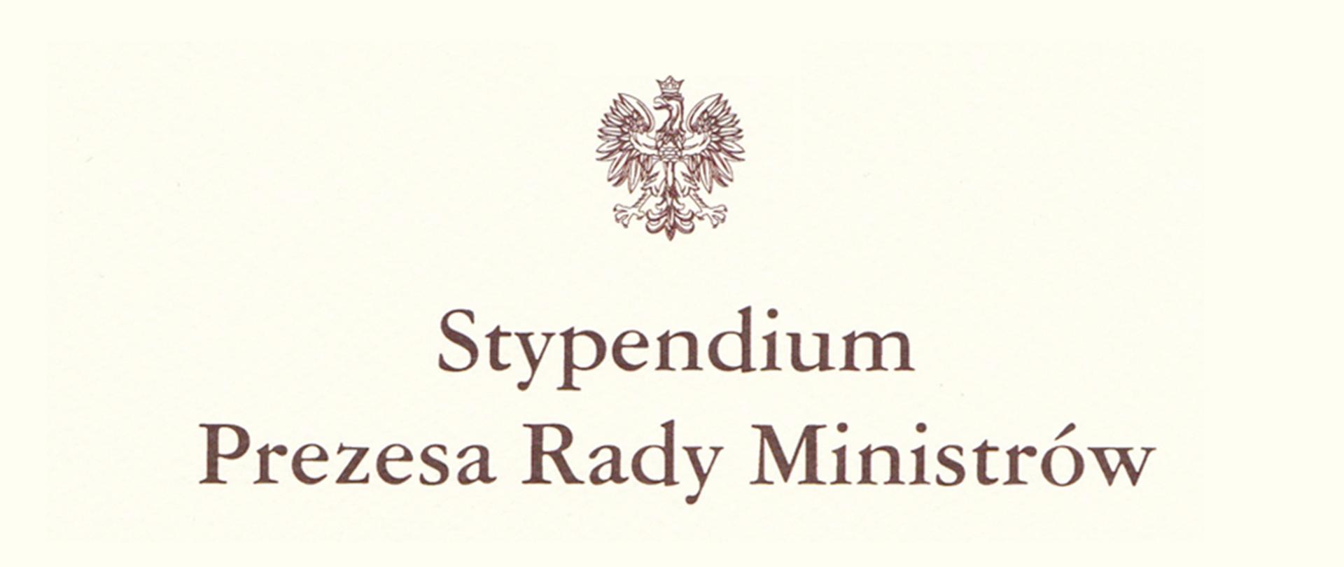 Orzeł i napis na kremowym tle