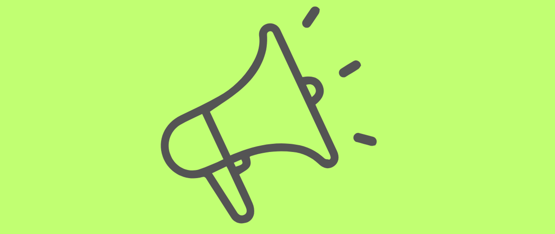 Szary megafon na jasno-zielonym tle.