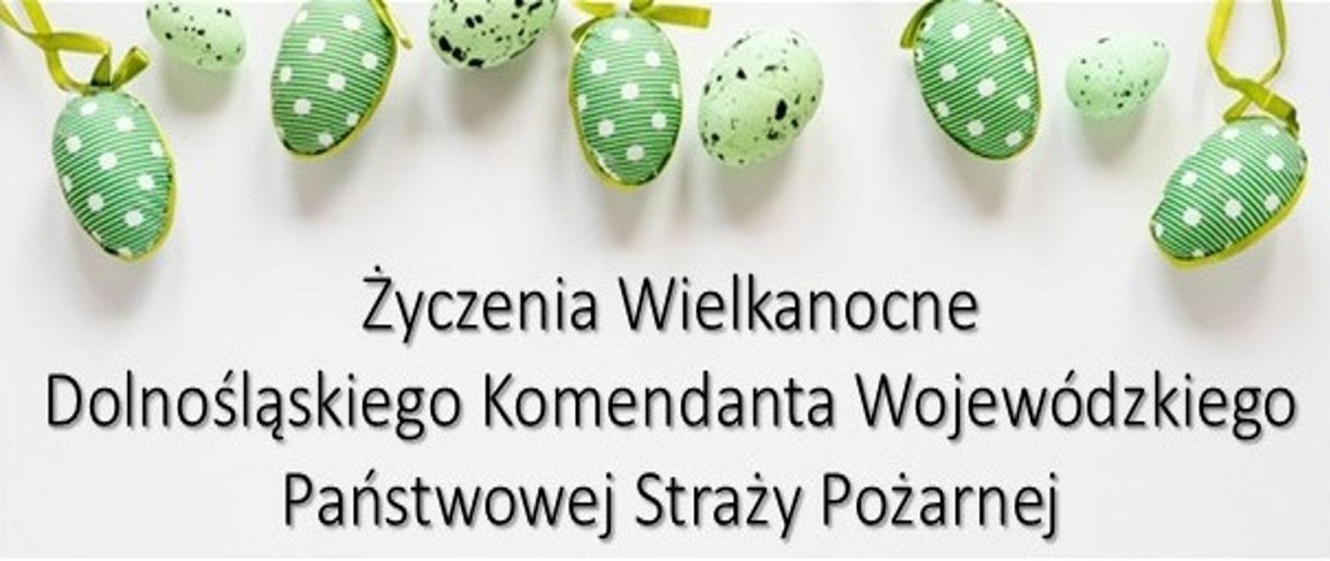 Grafika z wielkanocnymi pisankami oraz napisem „Życzenia Wielkanocne Dolnośląskiego Komendanta Wojewódzkiego Państwowej Straży Pożarnej”.