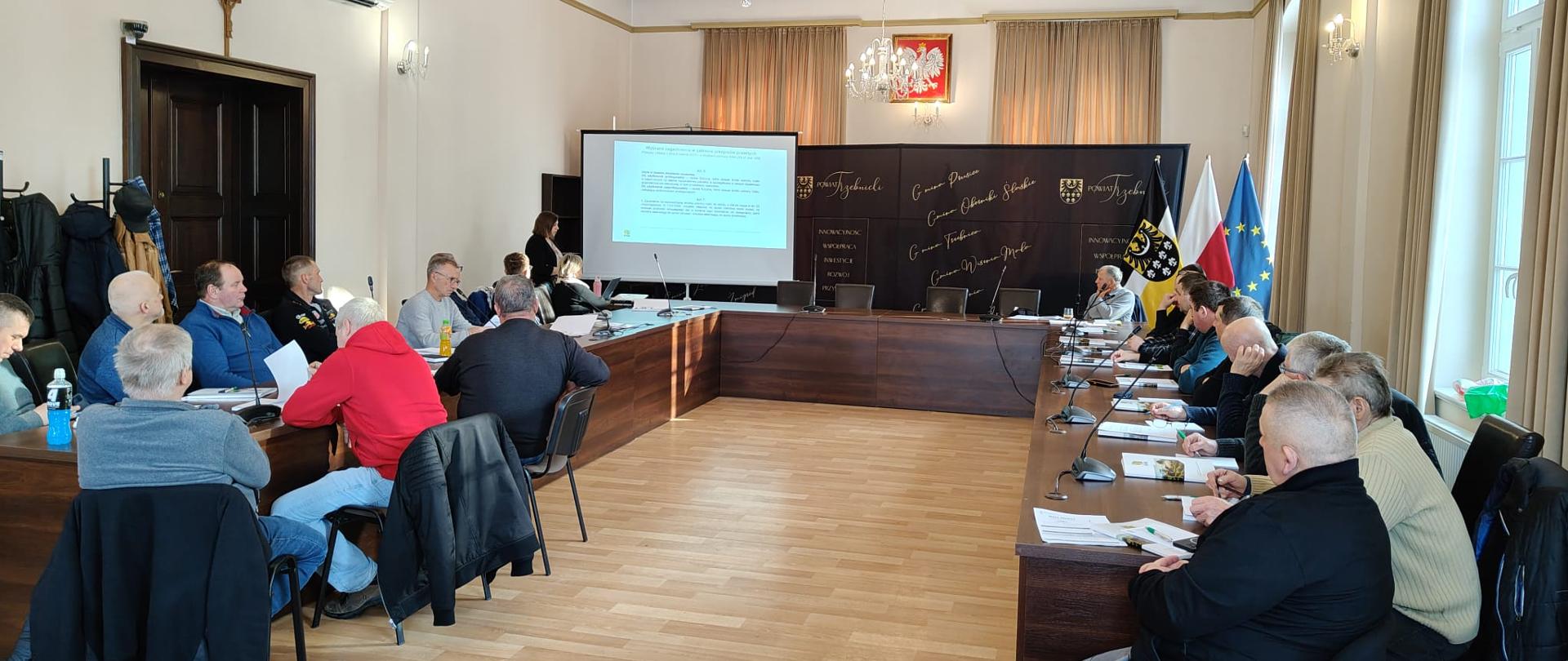 Uczestnicy w sali wykładowej podczas szkolenia