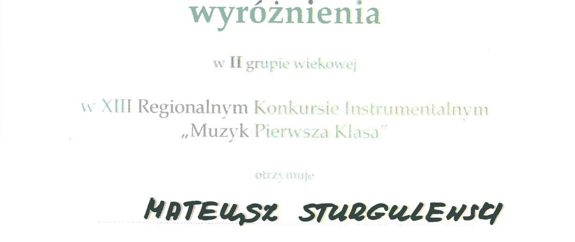 turkusowy nagłówek, drzewo, jesienne liście XIII Regionalny Konkurs Instrumentalny Muzyk Pierwsza Klasa, Biskupiec 22-23 listopada 2024, wyróżnienie w II grupie wiekowej, Mateusz Sturgulewski
