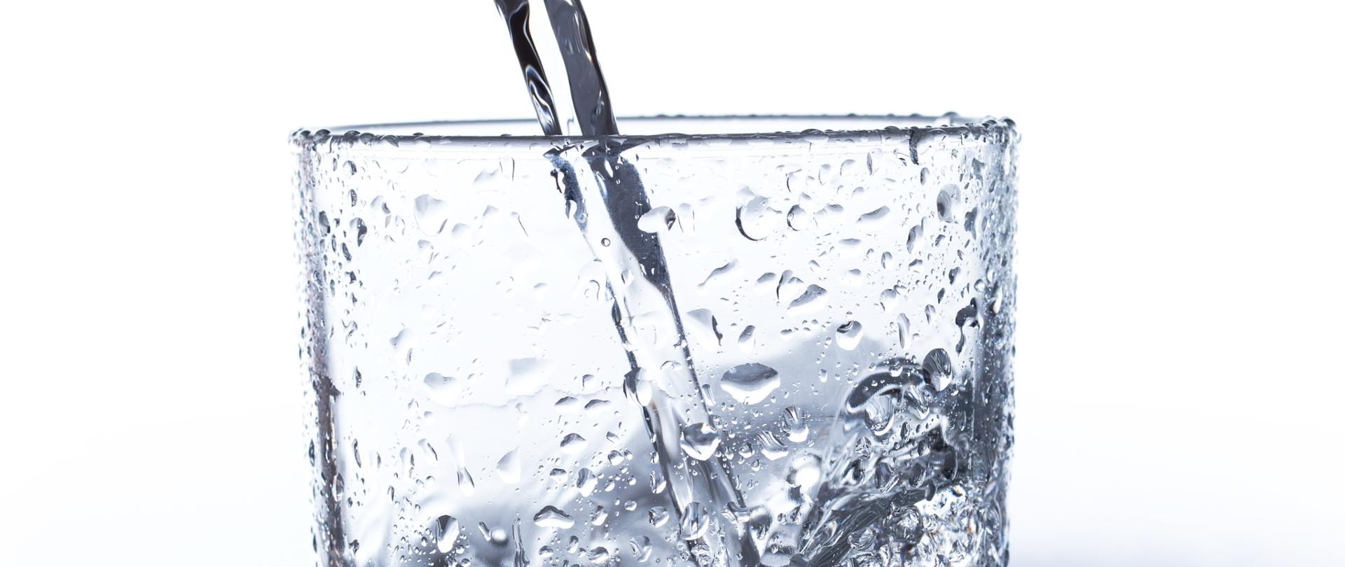 Glass with water on the table