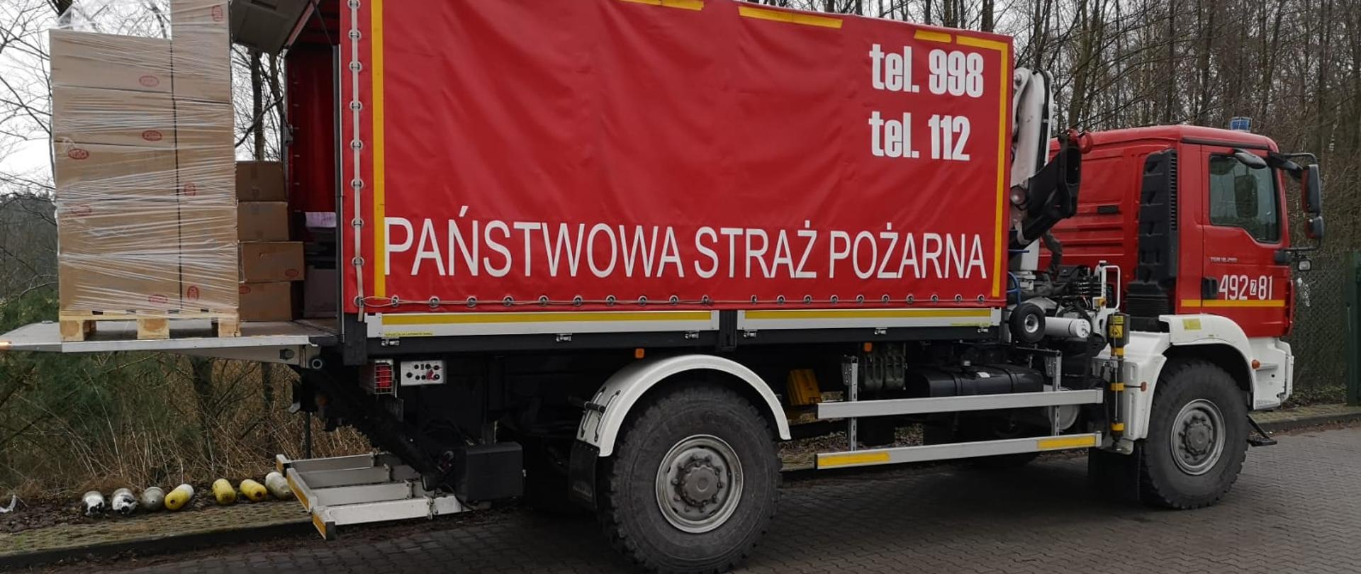 Pojazd PSP z dostawą maseczek.