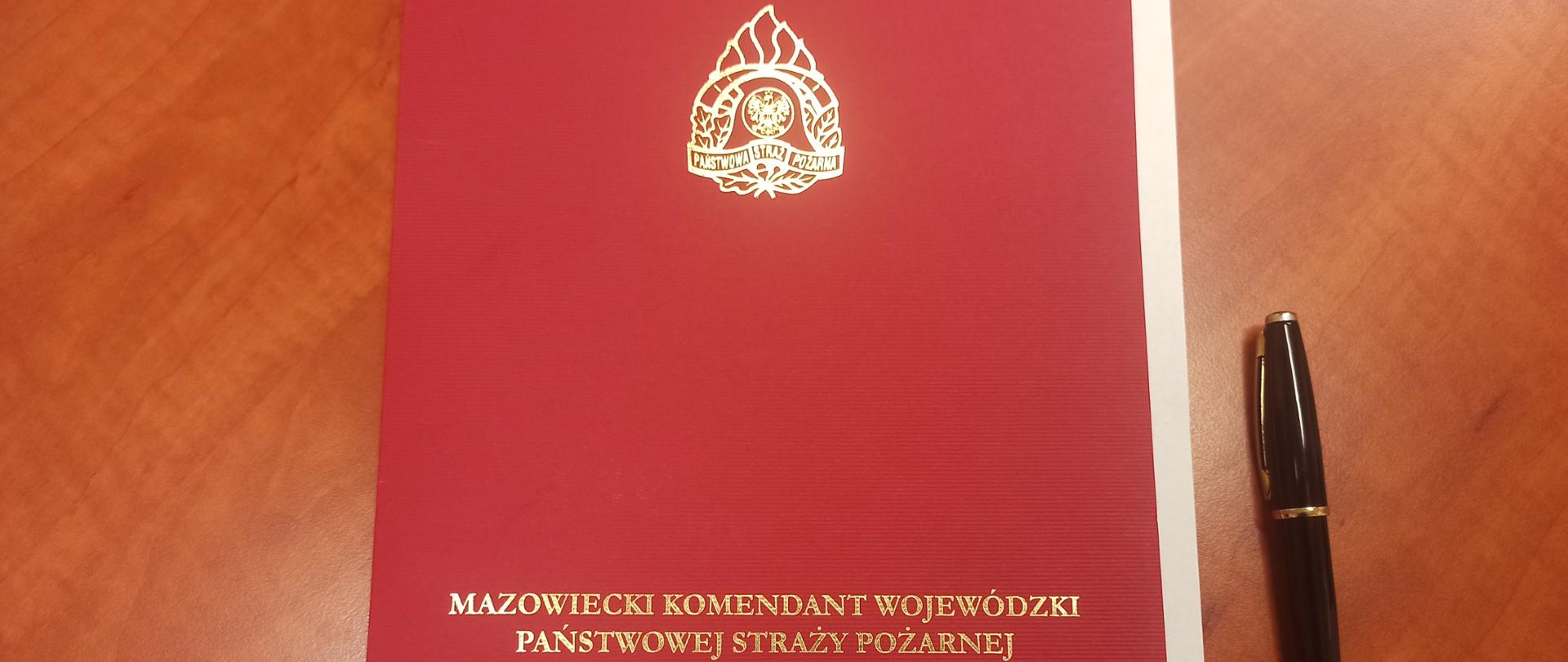 Na zdjęciu okładka w której przesłano rozkazy Mazowieckiego Komendanta Wojewódzkiego PSP o przyznaniu nagród funkcjonariuszom KM PSP w Warszawie
