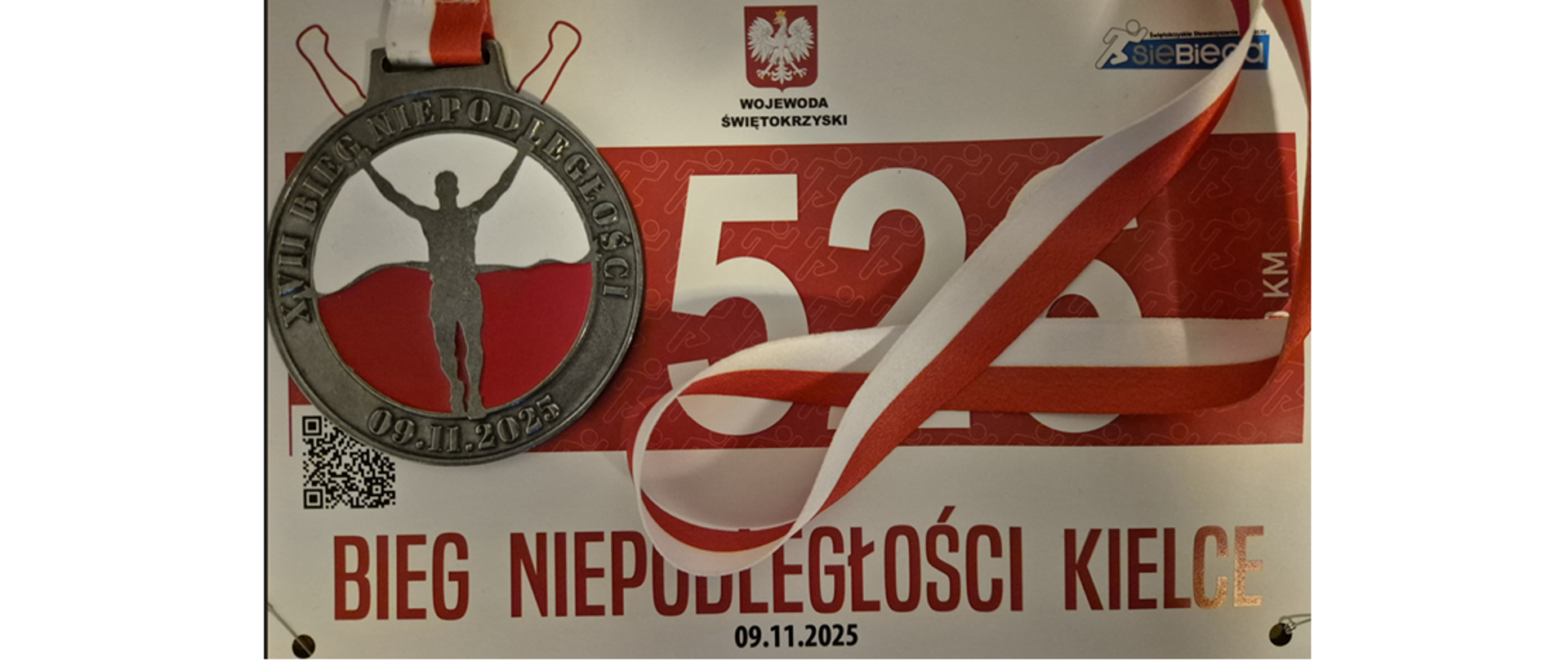 Zdjęcie przedstawia numer startowy z biegu