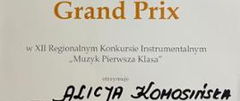 Na jasnym tle napis Grand Prix, poniżej w XII Regionalnym Konkursie Instrumentalnym "Muzyk Pierwsza Klasa" 