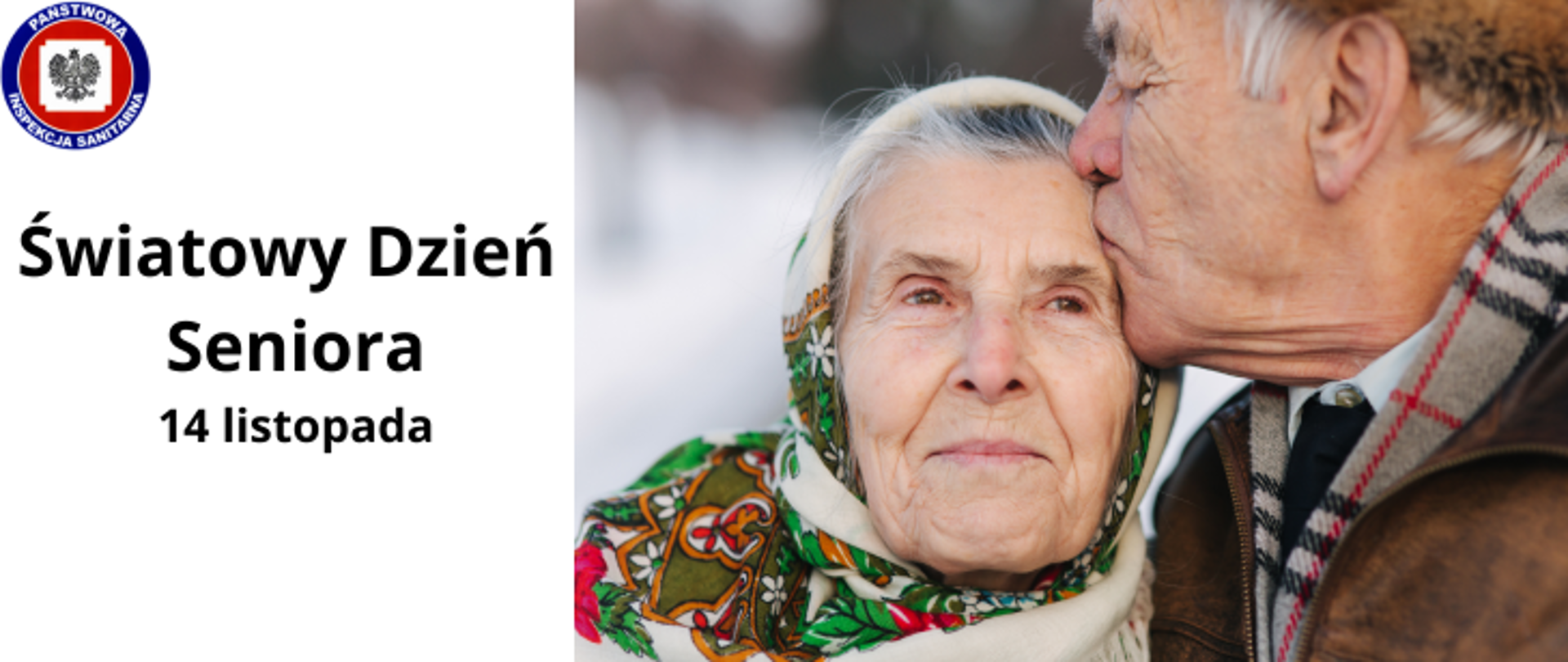 Dwoje starszych ludzi przytula się będąc na świeżym powietrzu. Pan całuje w czoło panią, głowa starszej pani opatulona kolorową chustkę. Pan ma na sobie brązową kurtkę i czapkę.