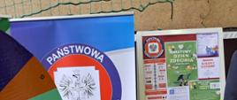 Stoisko wraz z banerem Powiatowej Stacji-Sanitarno-Epidemiologicznej w Rawiczu oraz tematyczną gazetką z okazji światowego Dnia Zdrowia