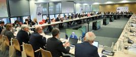 A group of people in a conference room - Informal meeting of EU Directors for Development Cooperation and Humanitarian Aid