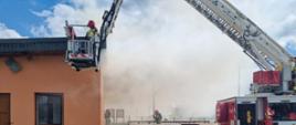 Pożar budynku na targowisku miejskim, działania gaśnicze