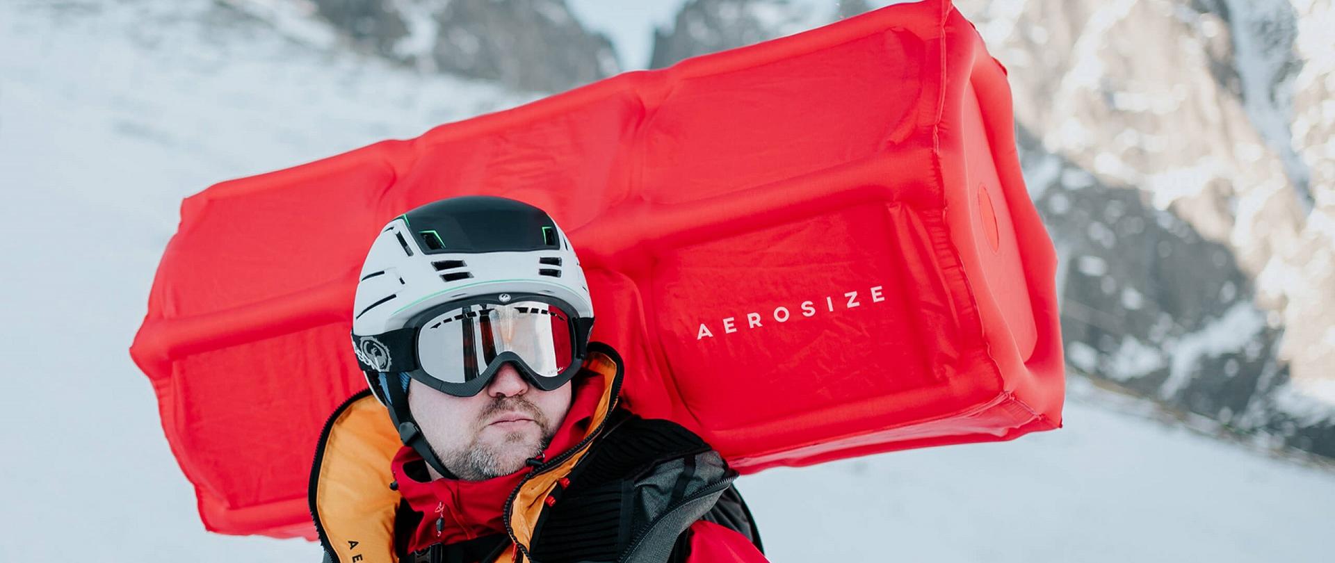 Our team member Maciej Roth in an activated AEROSIZE avalanche airbag.