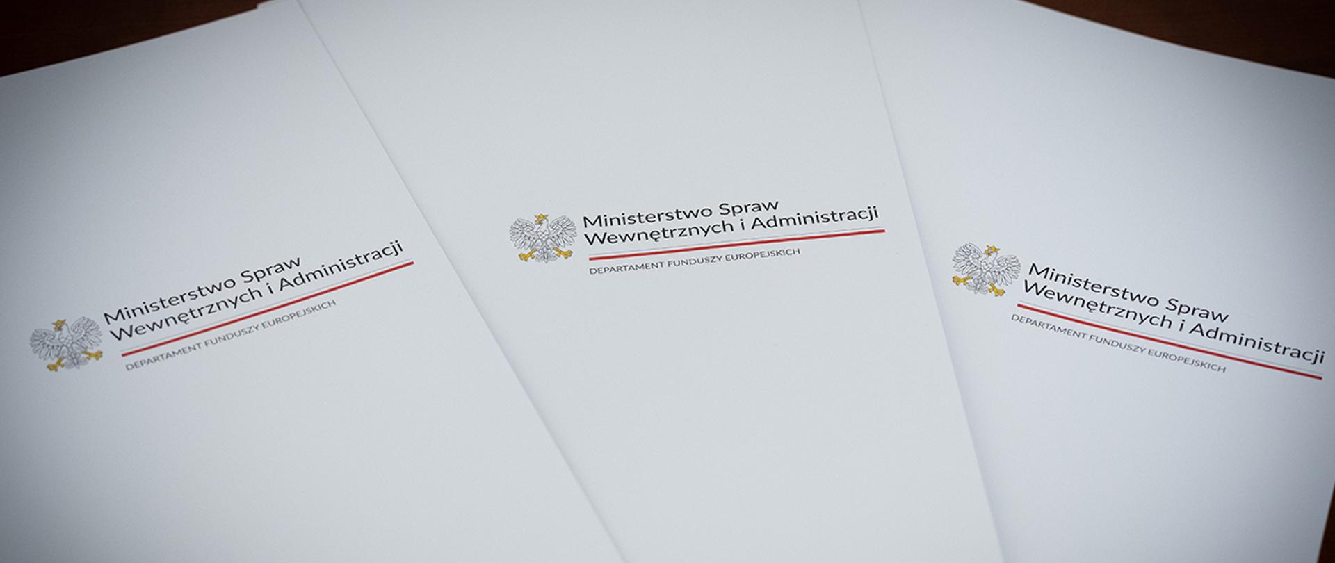 3 teczki Departamentu Funduszy Europejskich MSWiA 