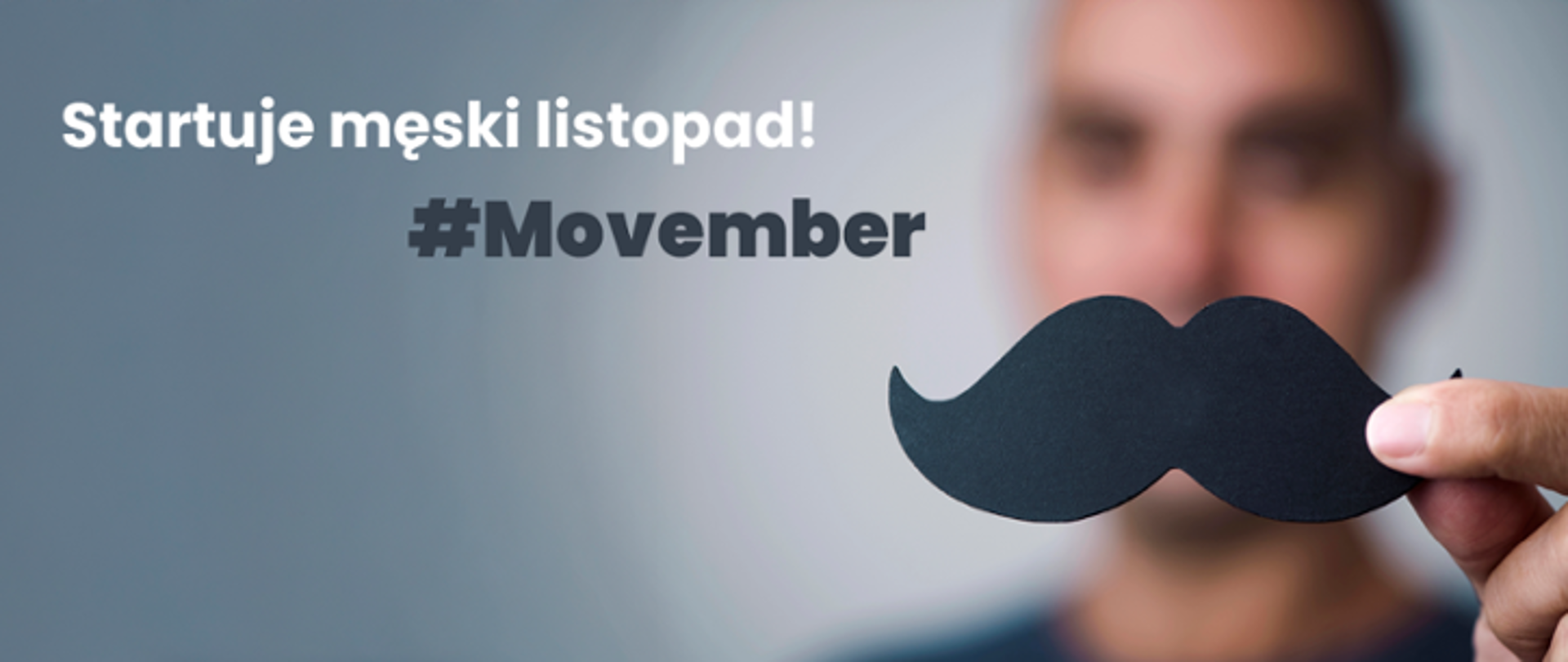 Na pierwszym planie wycięte męskie wąsy na tle męskiej twarzy obok napis : Startuje męski listopad! #Movember